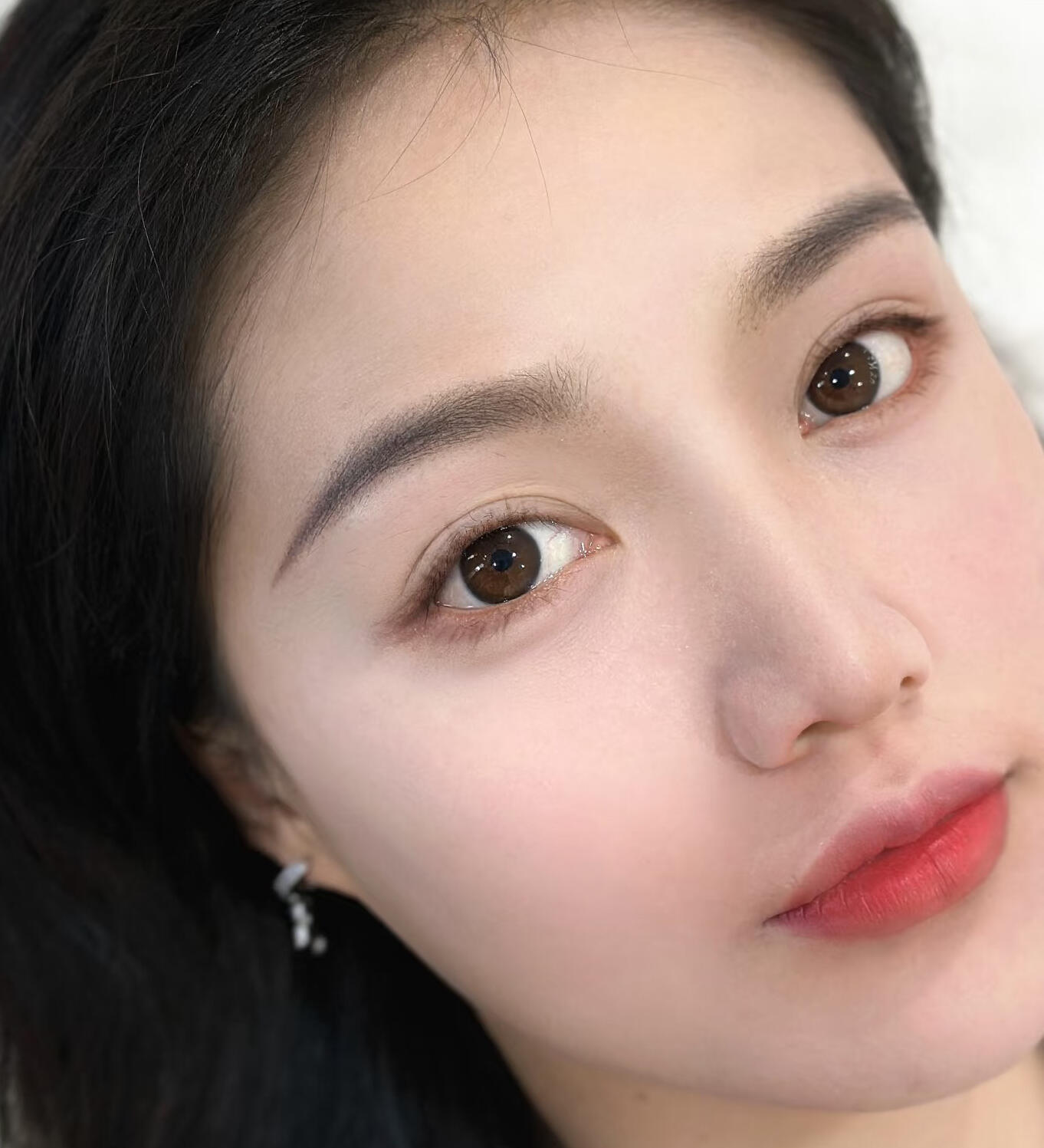 Soft Gradient Powder Ombre Eyebrow Embroidery Close-up of powder ombre eyebrow embroidery showcasing a soft, gradient finish.